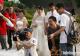 Features of wedding ceremony take shot in Tropic of Cancer Landmark Park